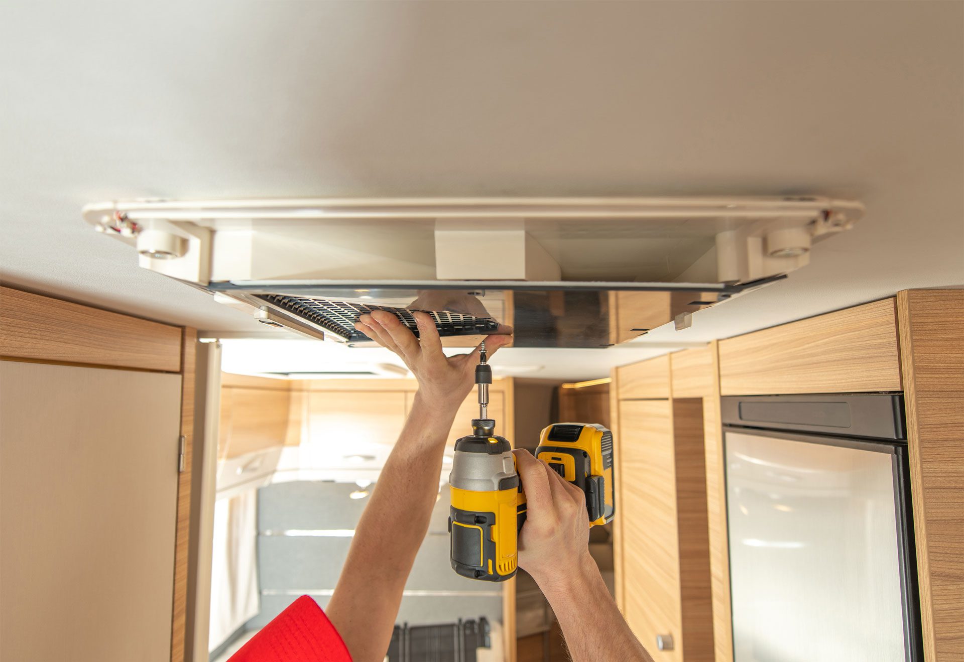 rv-technician-worker-replacing-air-conditioner-uni-2023-11-27-05-24-48-utc-1.jpg